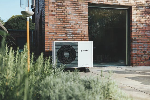 What happens during a heat pump survey and heat loss check?